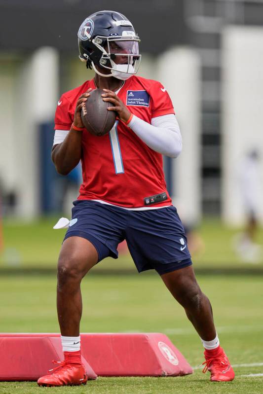 Tennessee Titans quarterback Cam Ward (1) looks to throw a pass during the NFL football team's ...