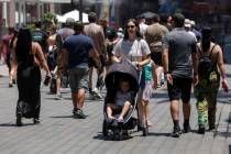Tourists walk along the Strip, Thursday, June 27, 2024, in Las Vegas. (Daniel Jacobi II/Las Veg ...