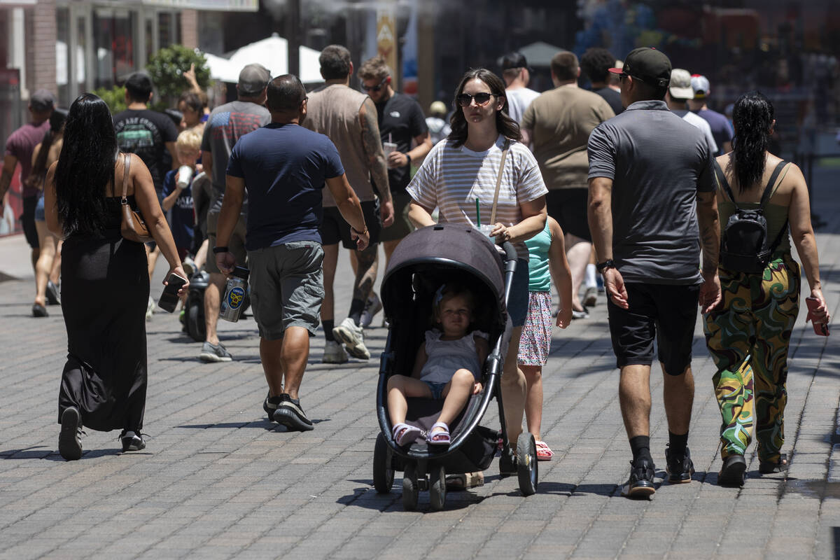 Tourists walk along the Strip, Thursday, June 27, 2024, in Las Vegas. (Daniel Jacobi II/Las Veg ...