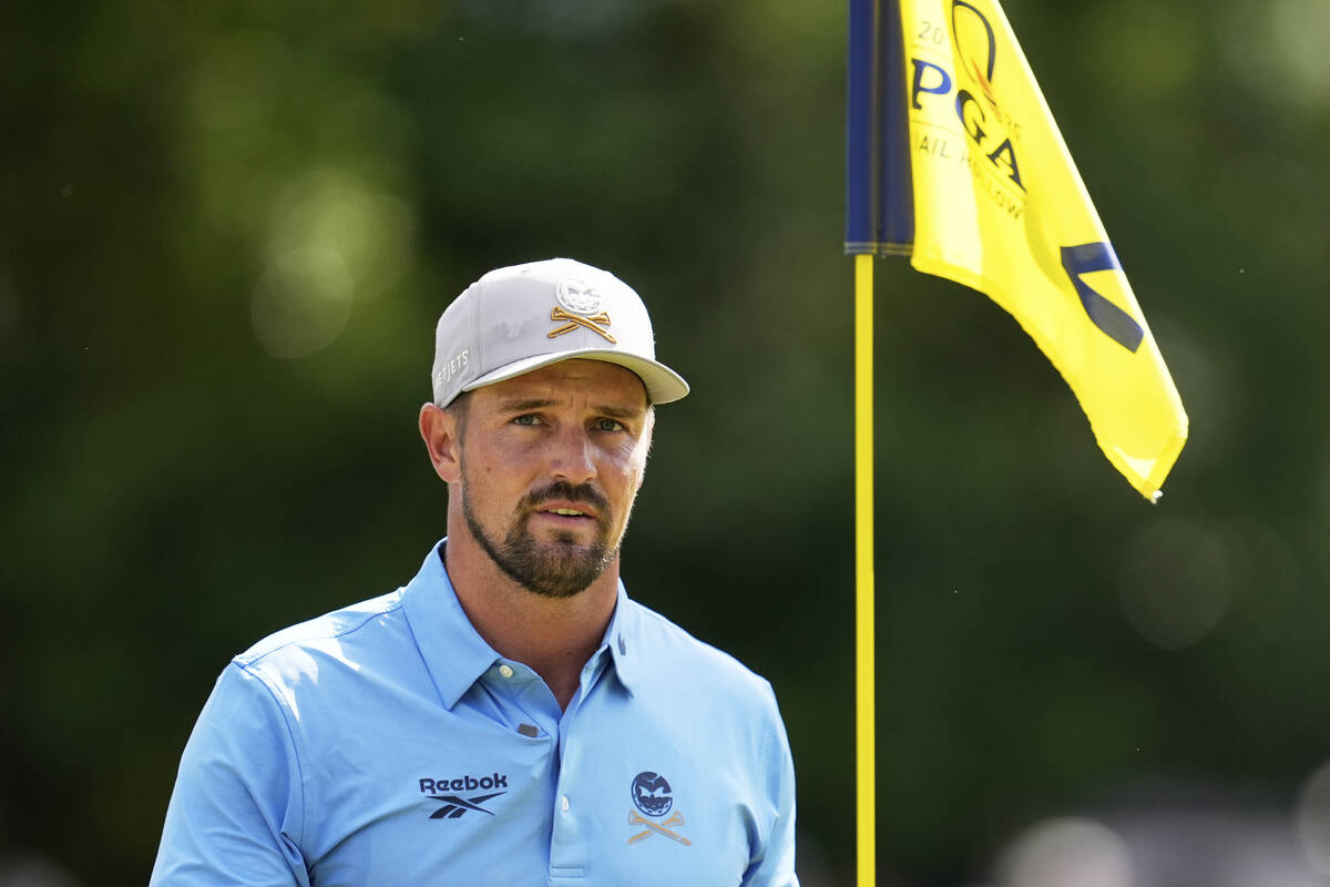 Bryson DeChambeau walks off the green on the second hole during a practice round for the PGA Ch ...