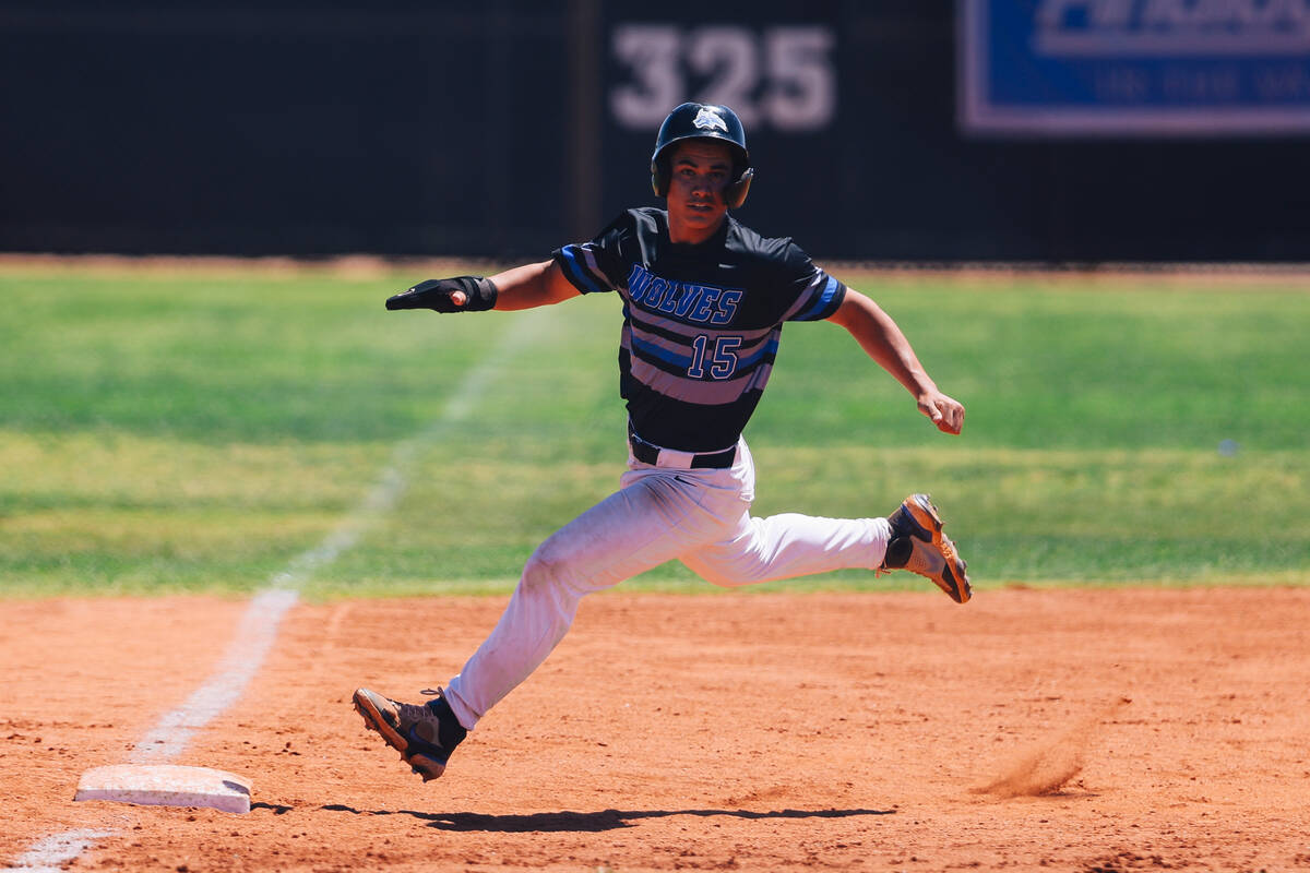 Basic third baseman Lyndon Lee runs to third base during a 5A baseball Southern Region title ga ...