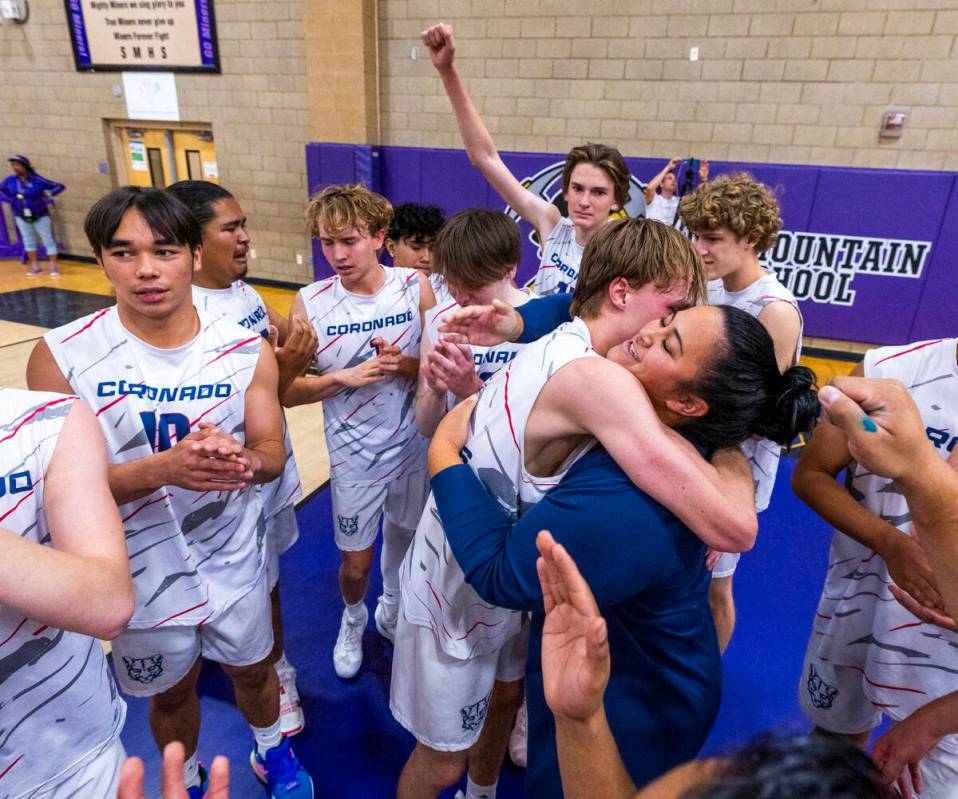Coronado players celebrate defeating Palo Verde to win the 5A boys volleyball state championshi ...
