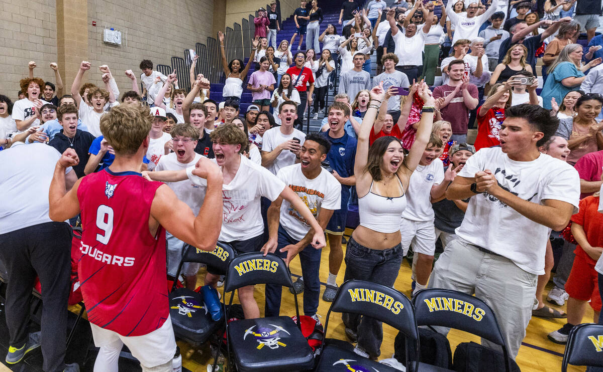 Coronado players celebrate with their fans in defeating Palo Verde to win the 5A boys volleybal ...