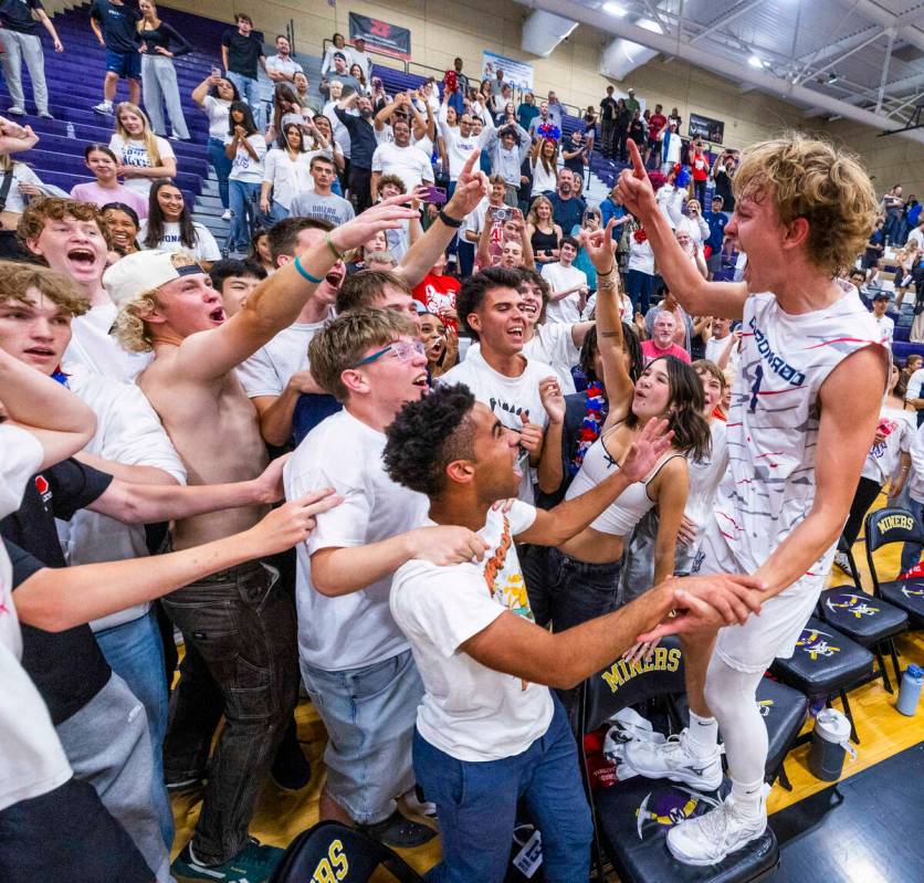 Coronado players celebrate with their fans in defeating Palo Verde to win the 5A boys volleybal ...