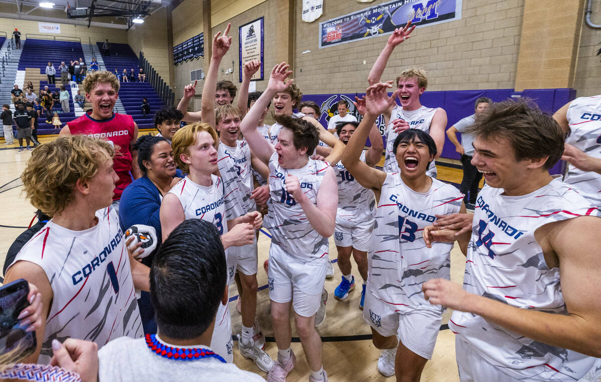 Coronado players celebrate defeating Palo Verde to win the 5A boys volleyball state championshi ...