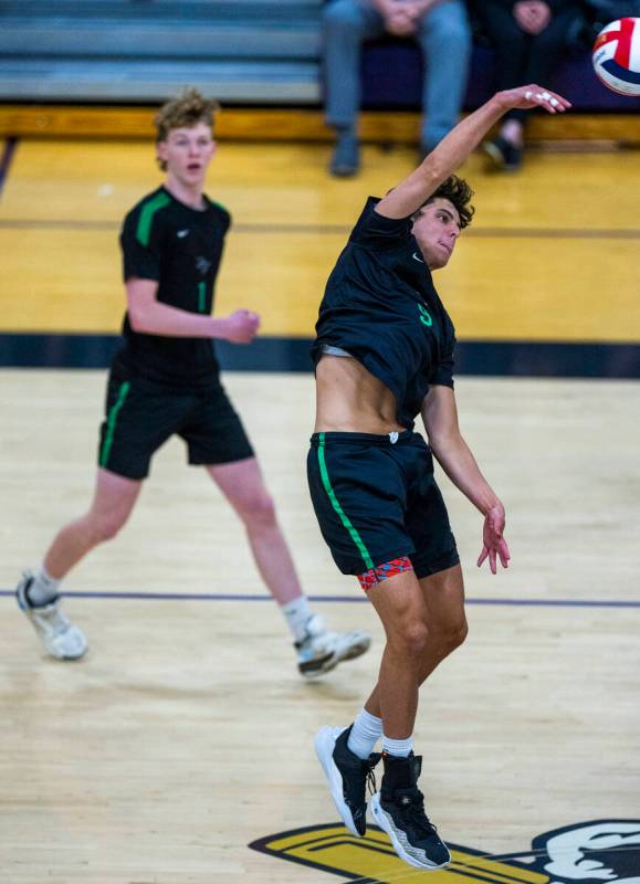 Palo Verde's Davide Bruce (9) spikes the ball over the net to Coronado during the 5A boys volle ...