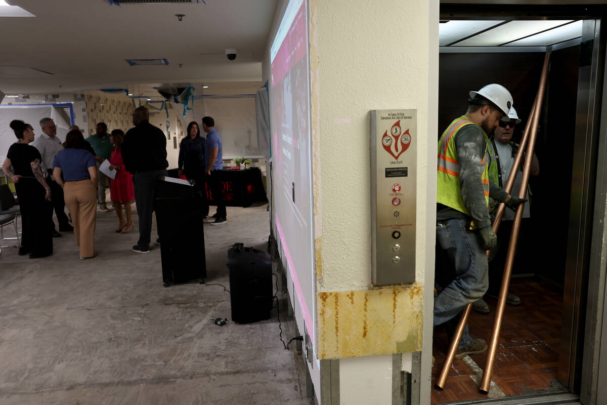 Renovations continue during a press conference at The Shade Tree women, children and pets shelt ...