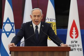 Israeli Prime Minister Benjamin Netanyahu speaks during the annual ceremony at the eve of Israe ...