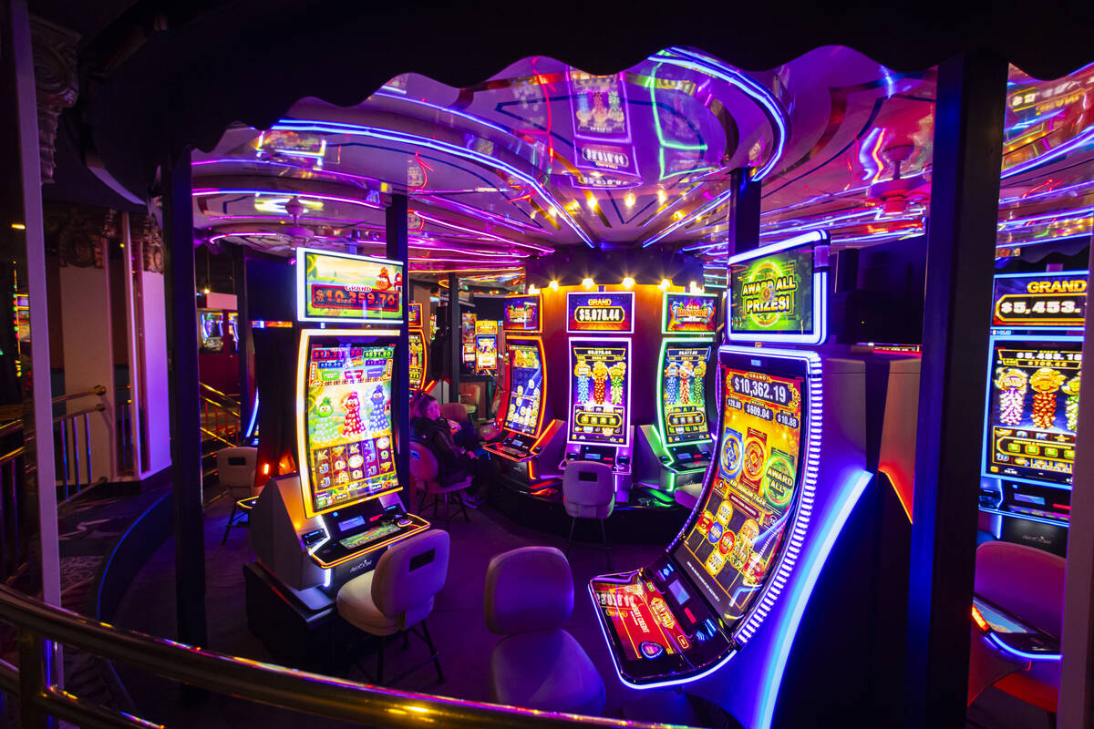 People play on a rotating floor of slot machines at Circus Circus on Dec. 11, 2024, in Las Vega ...
