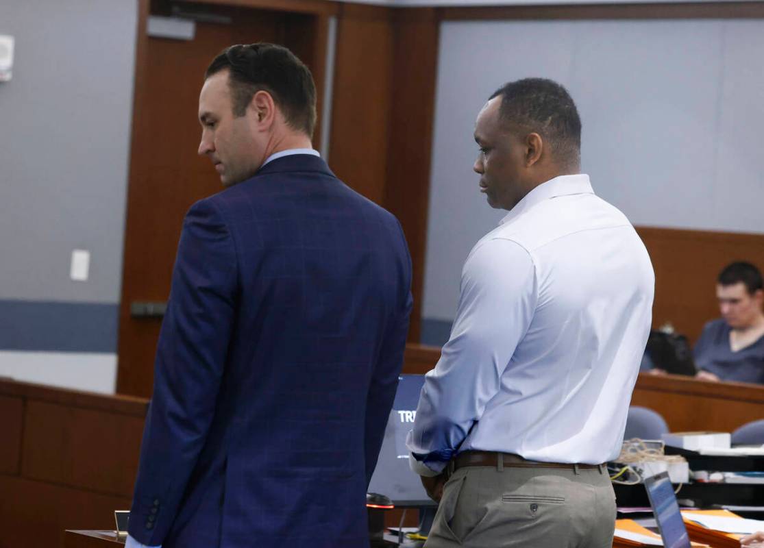 Attorney Warren Geller, left, representing Maurice Washington, a Las Vegas corrections officer ...