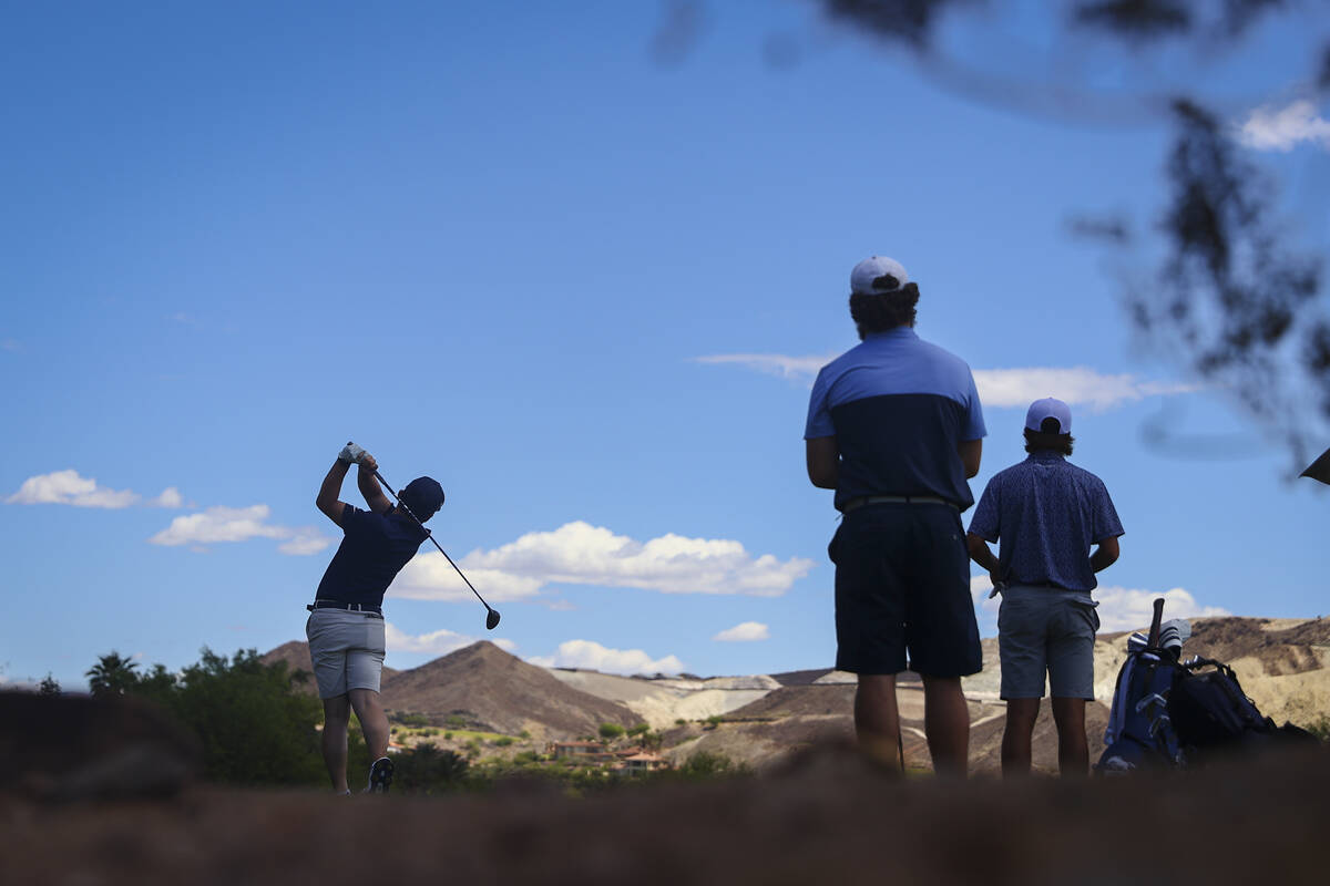 Golfers play at Reflection Bay Golf Club at Lake Las Vegas on Monday, April 28, 2025, in Hender ...