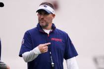 New England Patriots offensive coordinator Josh McDaniels gestures during the NFL football team ...