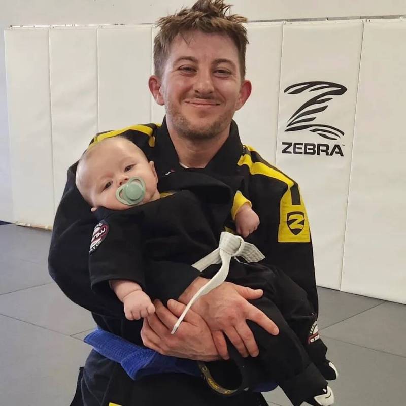 Patrick Deloriea and his son, Mason, pictured at Drysdale Jiu Jitsu. (GoFundMe)