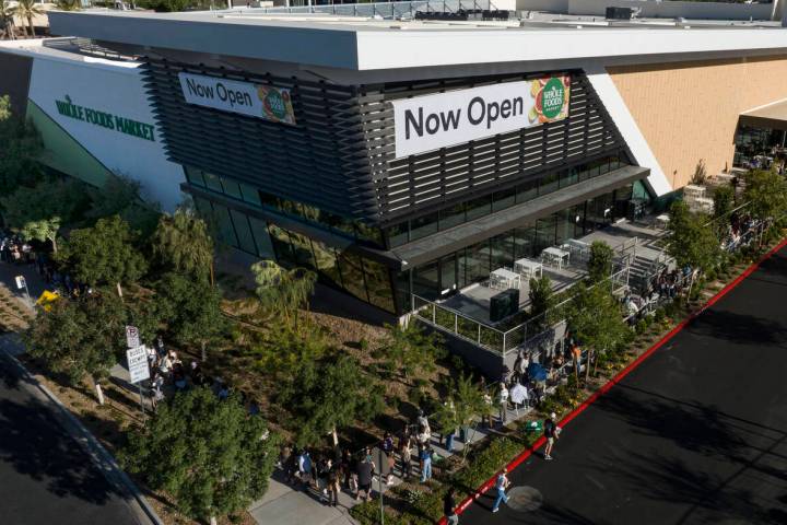 People line up outside of Summerlin Whole Foods during the grand opening of the store on Thursd ...