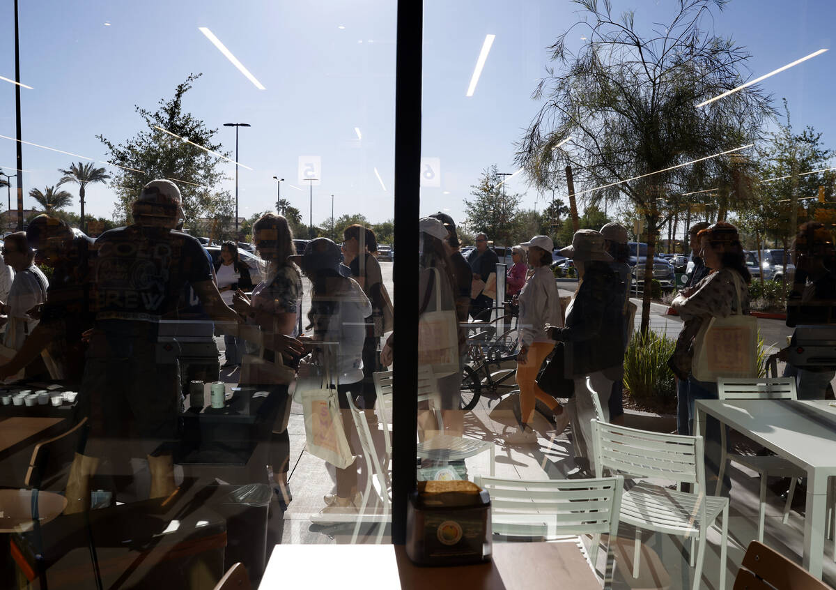 Shoppers line up as they wait for the grand opening of Summerlin Whole Foods on Thursday, May 1 ...
