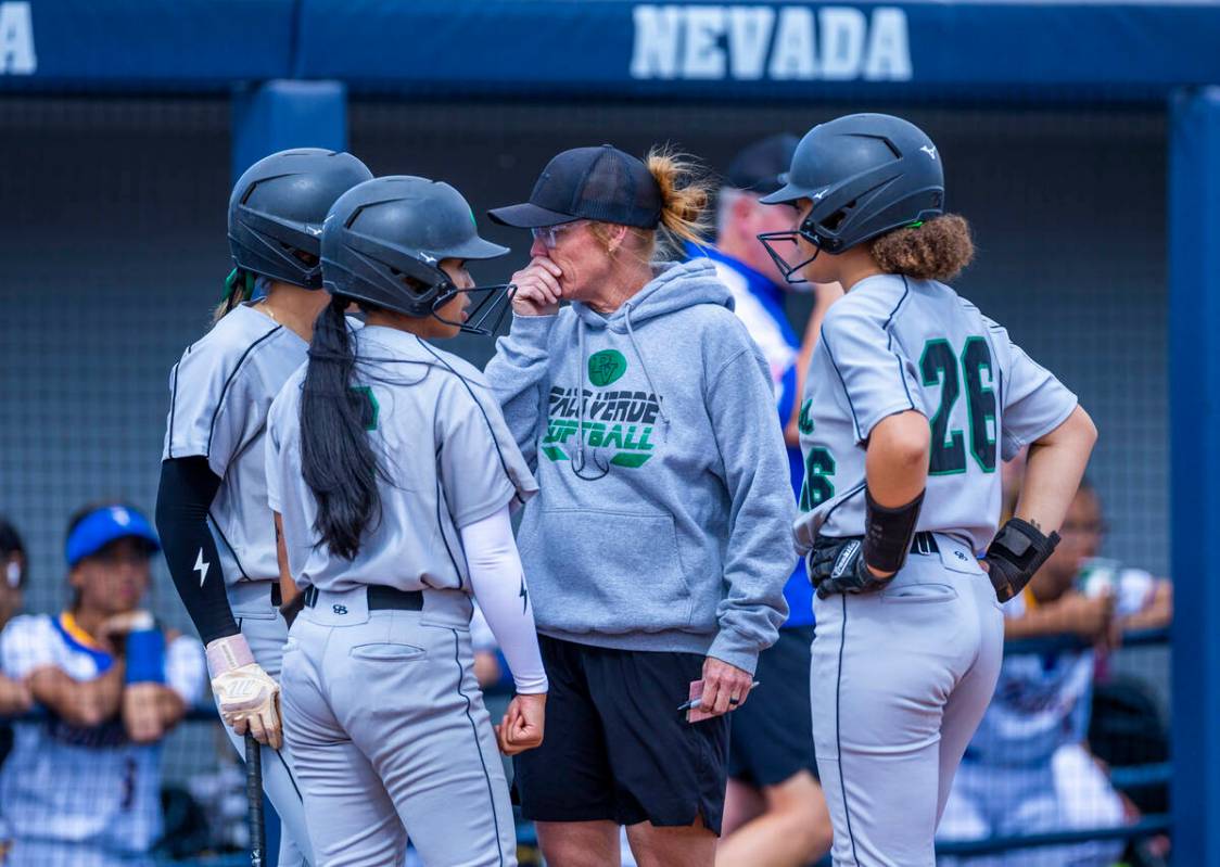 Palo Verde head coach Kelly Glass talks with her player in a timeout against Reed during day on ...