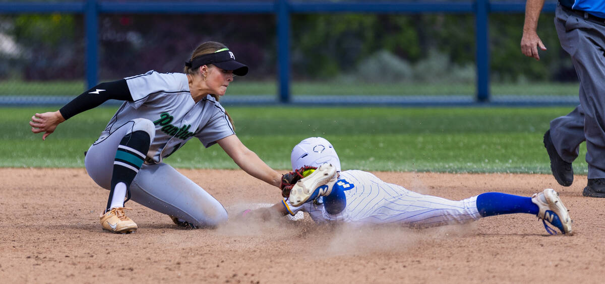 Palo Verde infielder Taylor Johns (11) tags out Reed runner Breanna Staats (9) at second base d ...