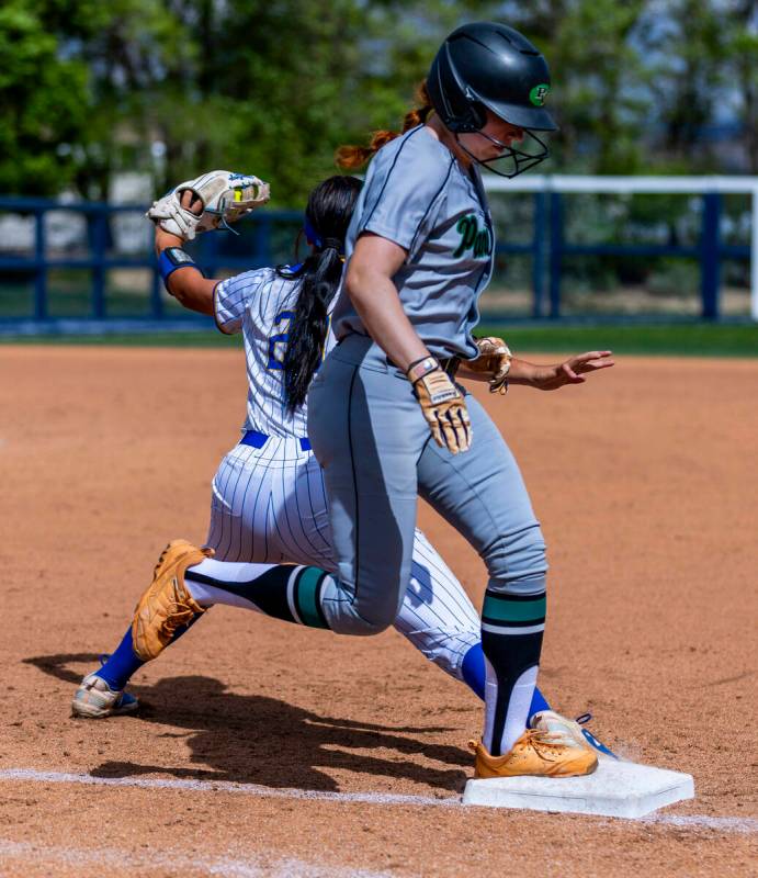 Palo Verde runner Mya Bartlett (18) attempts to beat the throw to first base and a catch by Ree ...