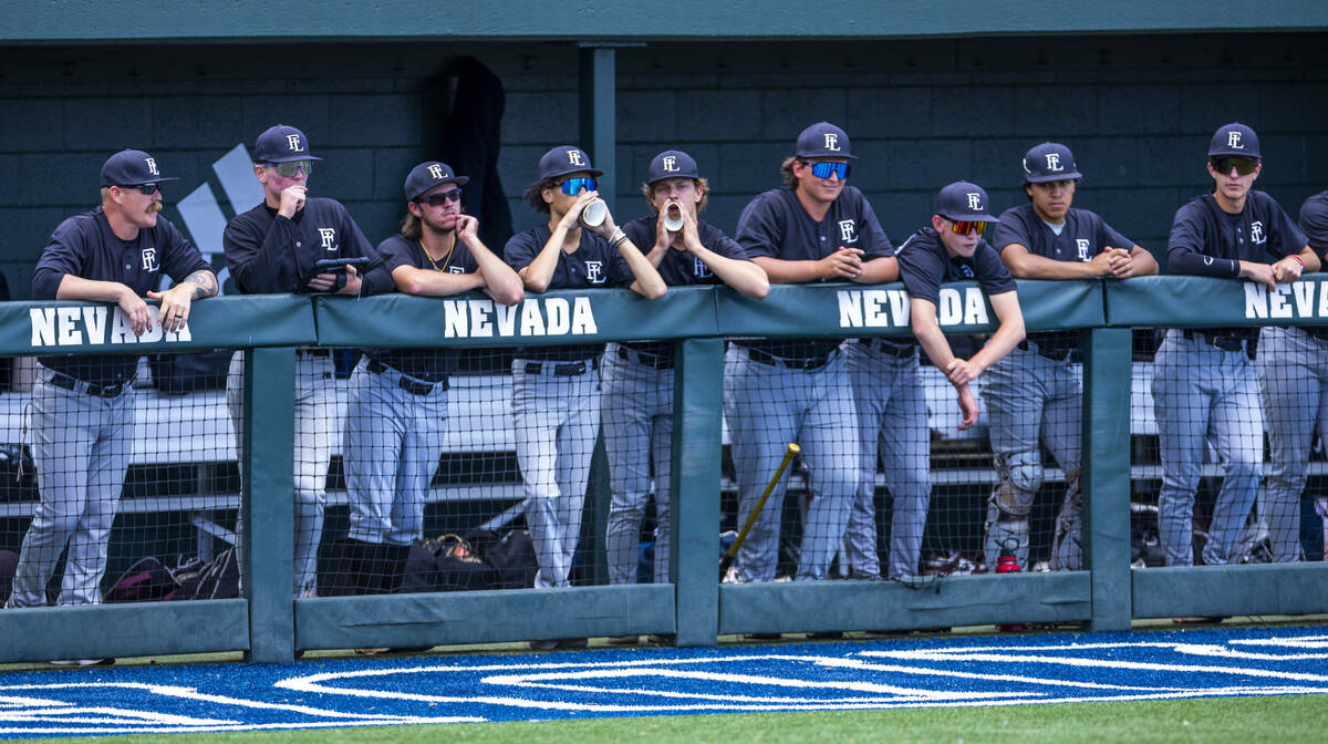 Faith Lutheran players cheer for their batter against Bishop Manogue during day one of the 5A b ...