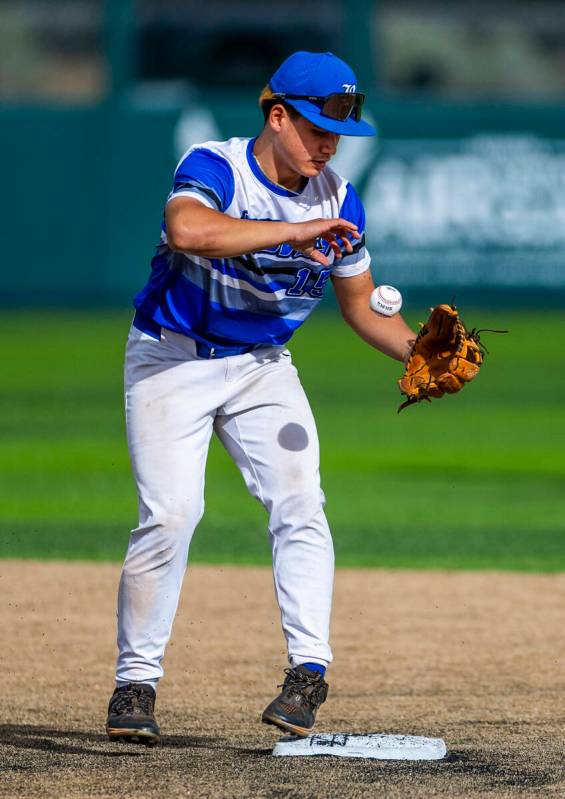 Basic infielder Lyndon Lee (15) snatches a ball at second base against Reno during day one of t ...