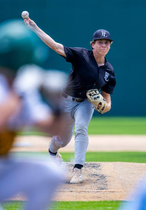 Faith Lutheran pitcher Jordan Watkins (19) winds up against Bishop Manogue during day one of th ...