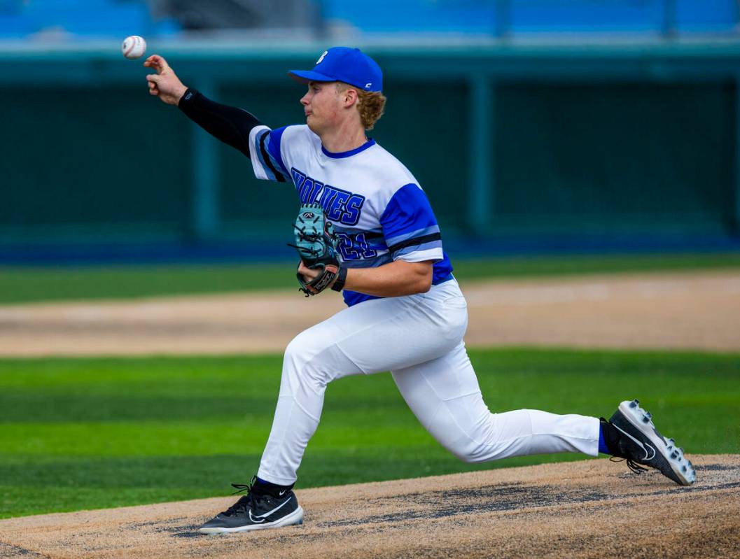 Basic pitcher Lincoln Evans (21) releases a throw to the plate against a Reno batter during day ...