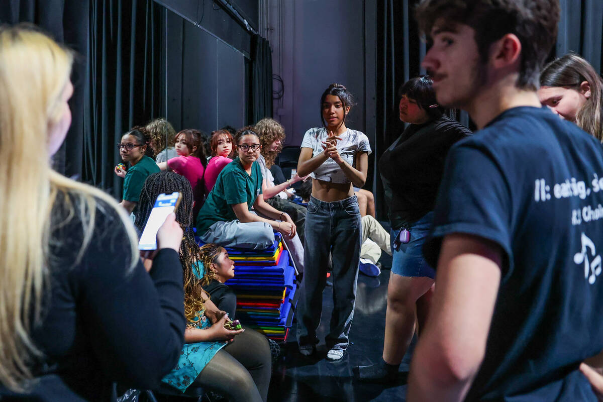 Students from Del Sol Academy group together for notes from Selma Greer, left, during a rehears ...