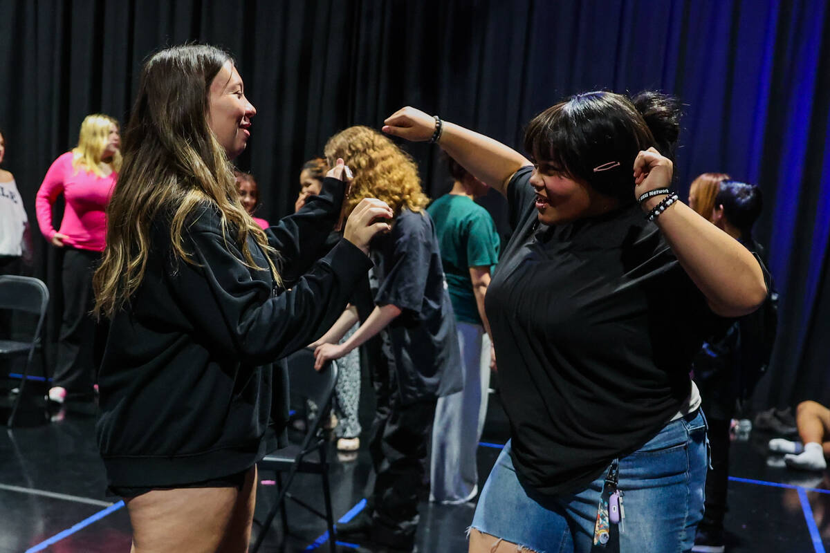 Audrianna Preston, 16, right, prepares for a rehearsal for a performance of “Mean Girls” at ...