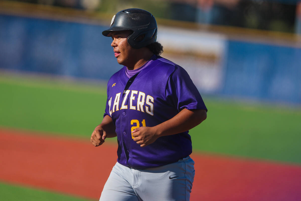 Durango outfielder Jon Turner runs to the dugout after being out during a 4A high school baseba ...