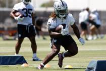 Raiders running back Ashton Jeanty goes through a drill during the 2025 rookie mini camp at the ...