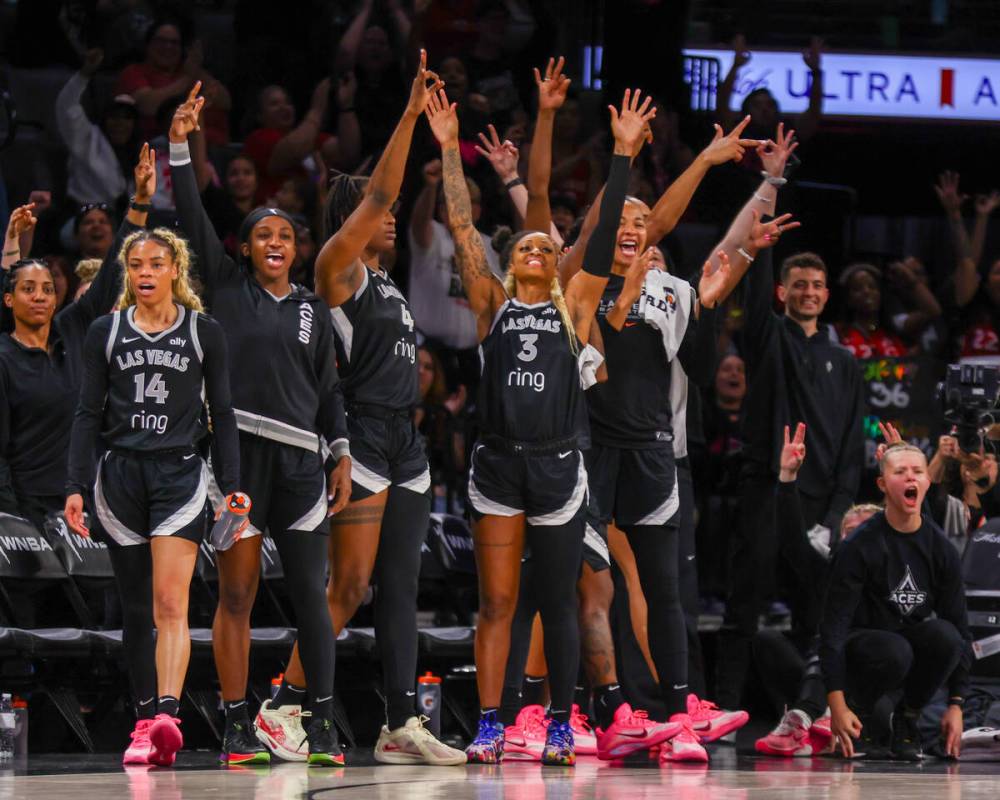 The Aces bench celebrates a three-pointer during a pre-season game against Phoenix Mercury on T ...