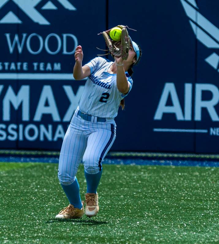 Centennial outfielder Layla Bosco (2) secures a long fly ball from a Palo Verde batter during ...