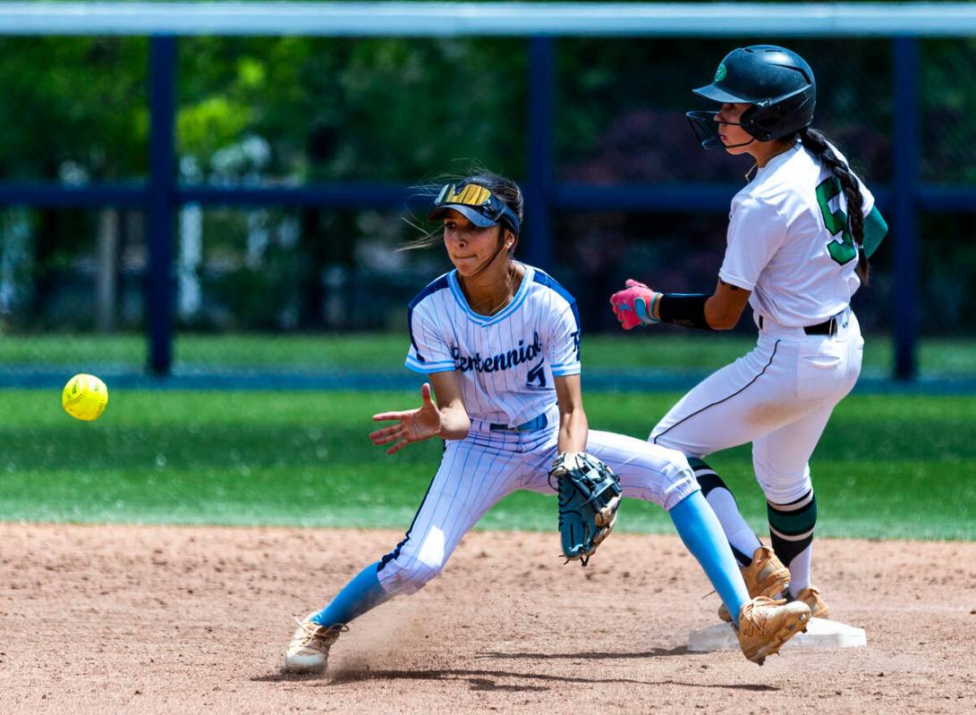 Centennial infielder Valeria Lopez (5) eyes a throw to second base as Palo Verde runner Ava Cru ...