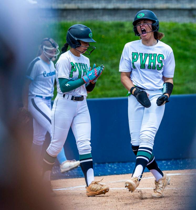 Palo Verde runner Keileanna Johnson (26) celebrates a score with teammates against Centennial d ...