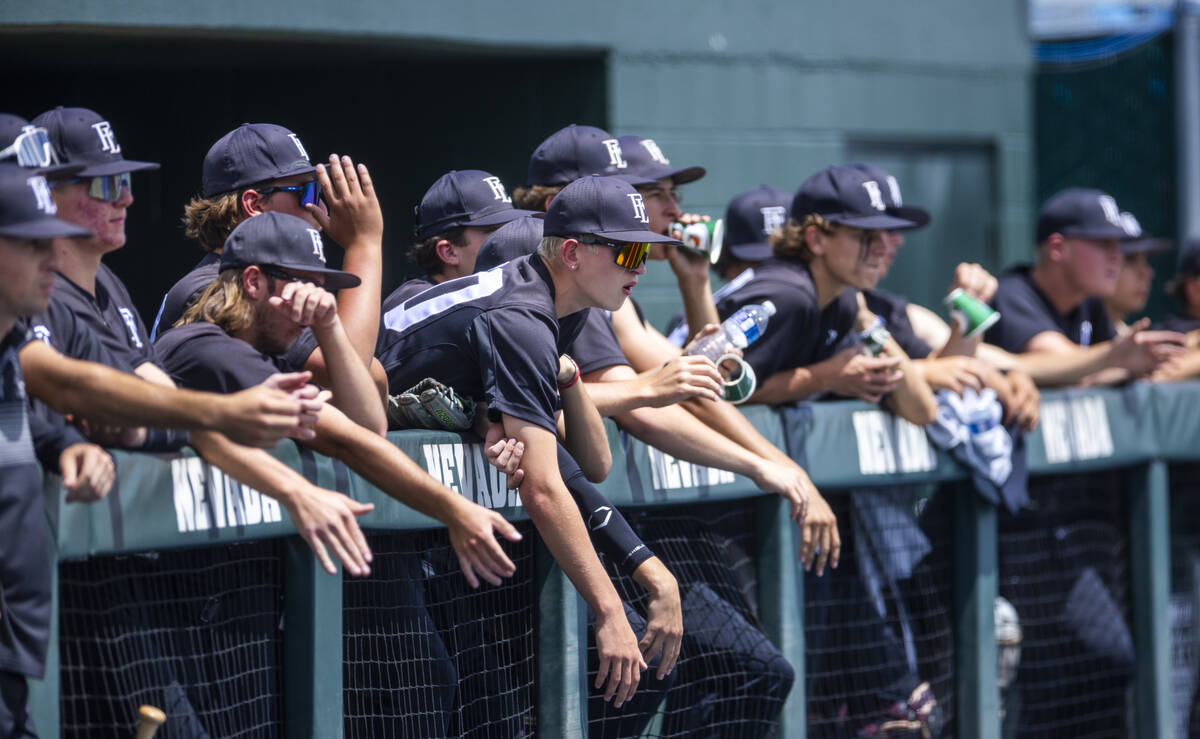 Faith Lutheran players motivate their batter against Basic during day two of the 5A baseball st ...
