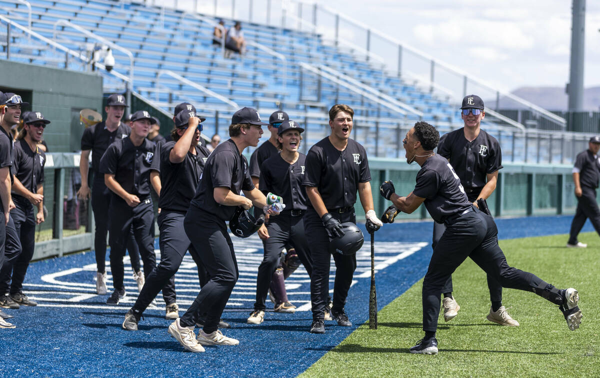 Faith Lutheran gets fired up for Basic during day two of the 5A baseball state tournament from ...