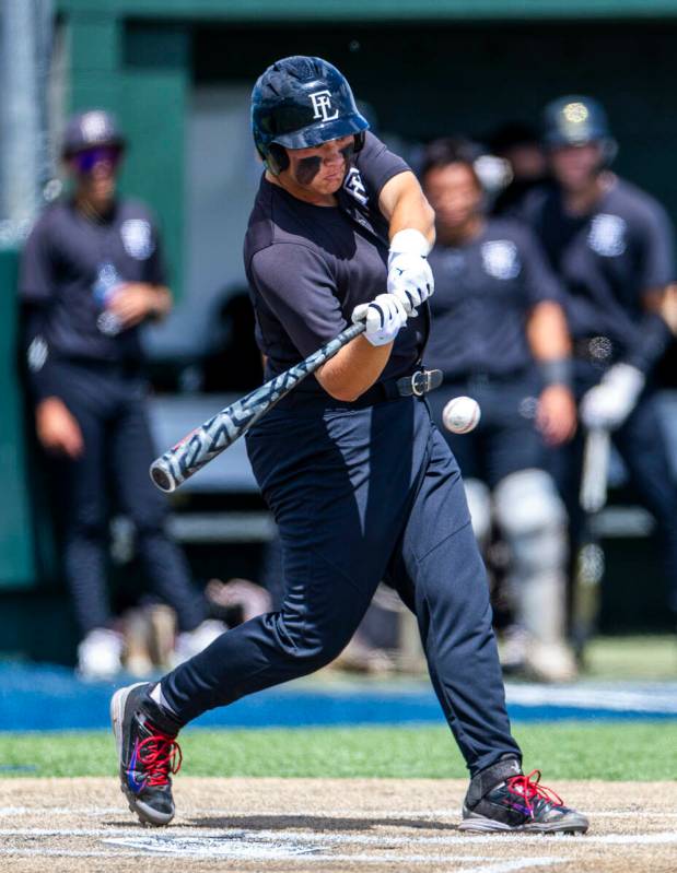 Faith Lutheran batter Dylan Swanson (0) connects on a Basic pitch during day two of the 5A base ...