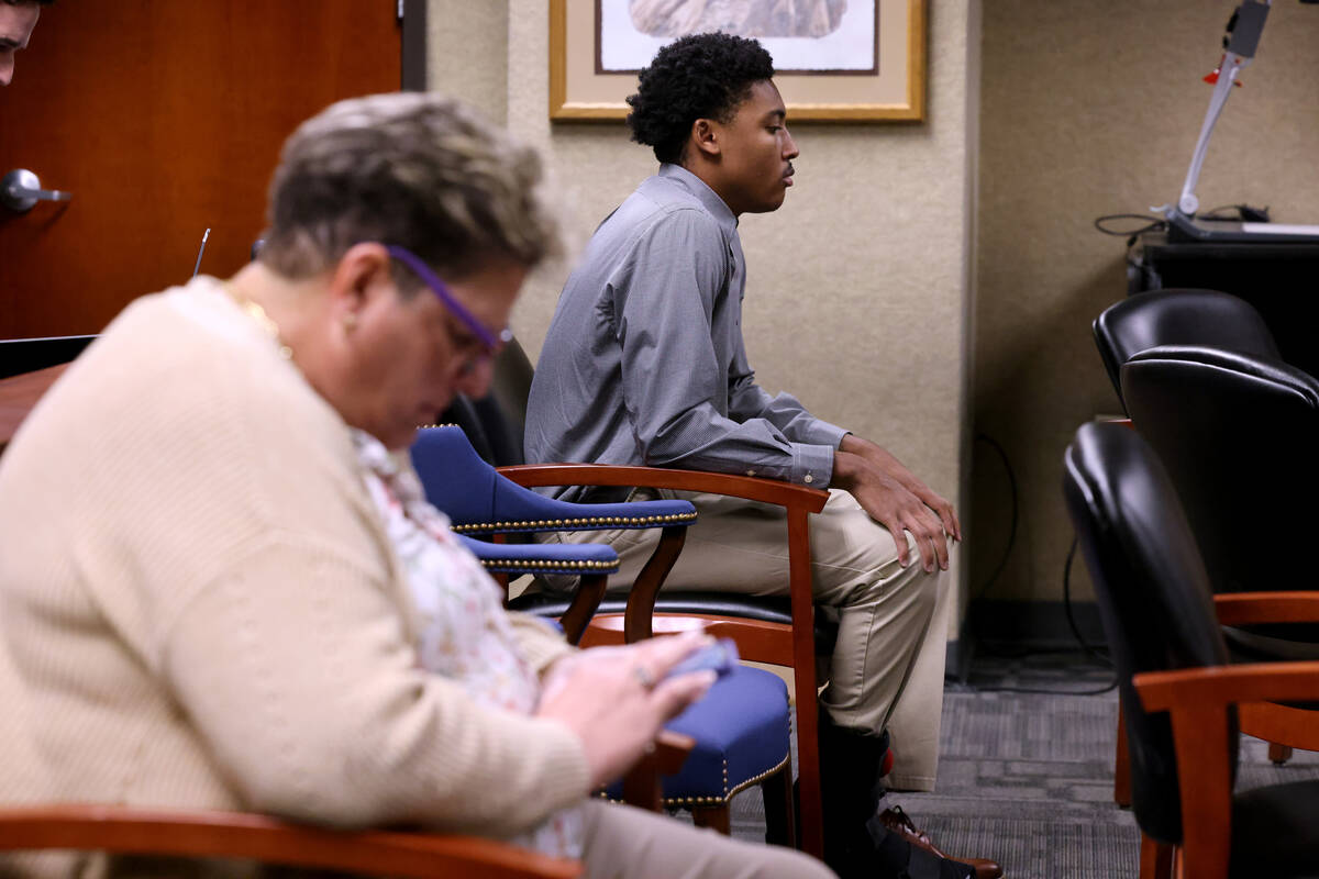Former UNLV basketball recruit Zaon Collins waits before testifying on the witness stand in Cla ...