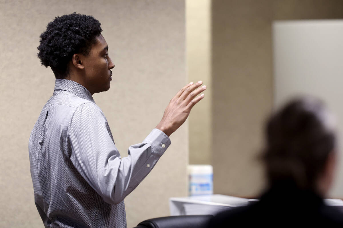 Former UNLV basketball recruit Zaon Collins is sworn in on the witness stand in Clark County Di ...