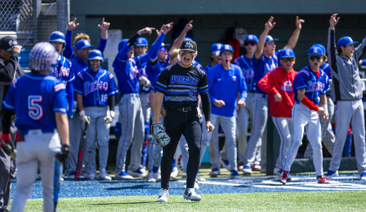 Basic pitcher Matthew Kelley (23) is displeased as a wild throw home results in a Reno score du ...