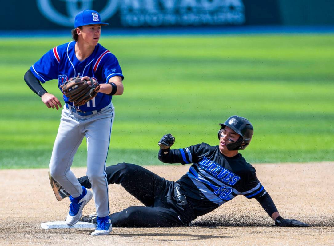 Basic runner (18) arrives to second base late as Reno infielder Logan Ford (11) makes the tag o ...