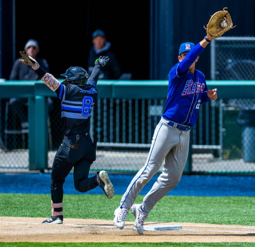 Basic runner Tate Southisene (8) beats the throw to first base as Reno infielder Maack Edwards ...