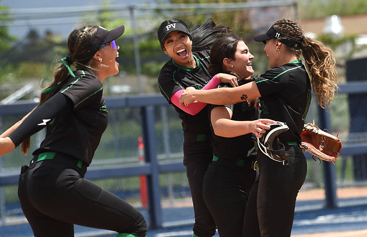 Palo Verde players celebrate after defeating Centennial 7-3 to win the NIAA state softball cham ...