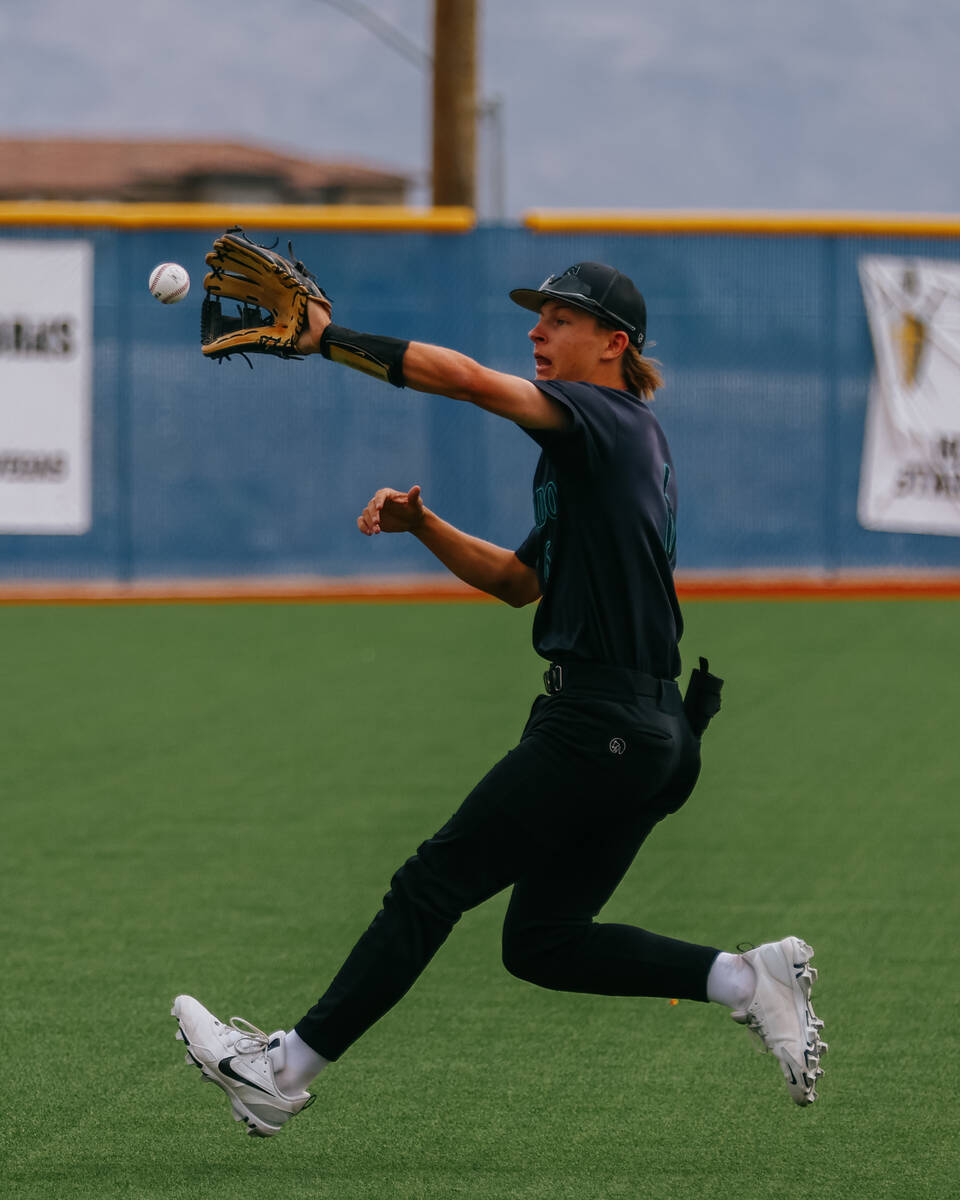 Silverado infielder Hogan Hawkins (6) runs down a bouncing ball hit by Durango during the first ...