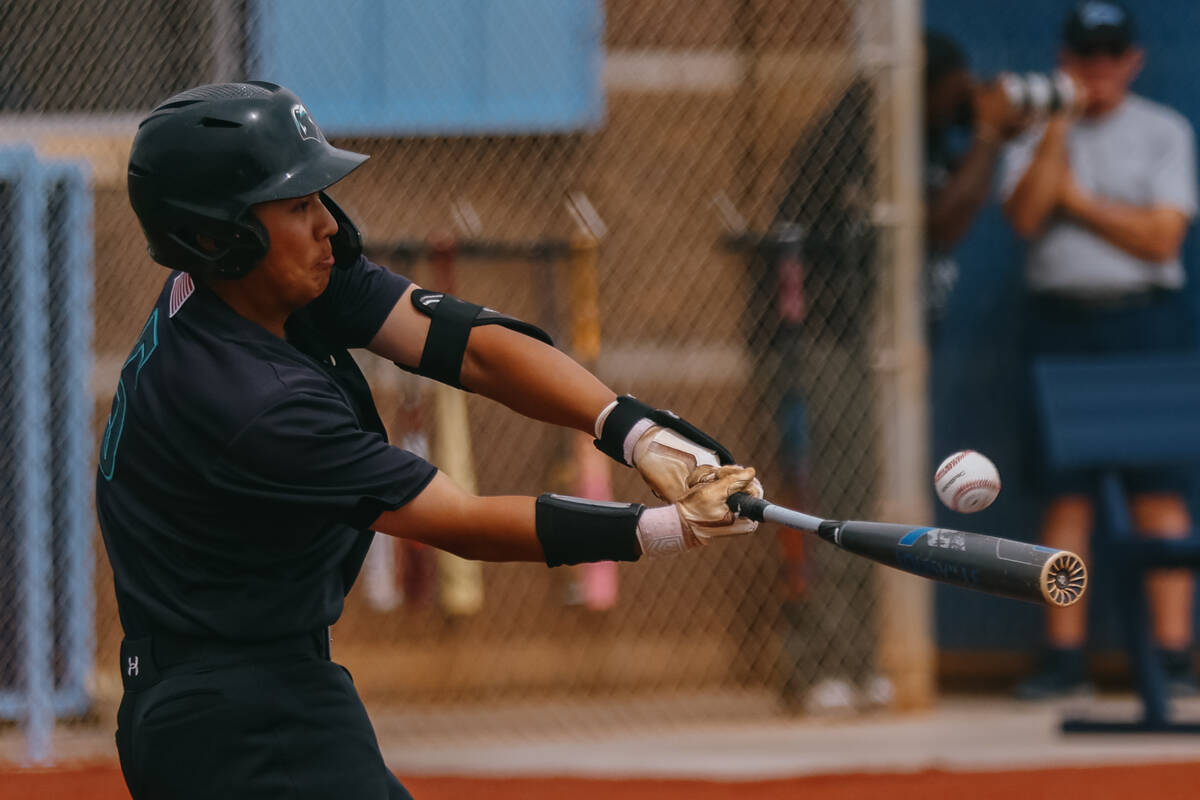Silverado’s Kanoa Wolfgang (5) connects with a pitch in the first game of the NIAA 4A St ...