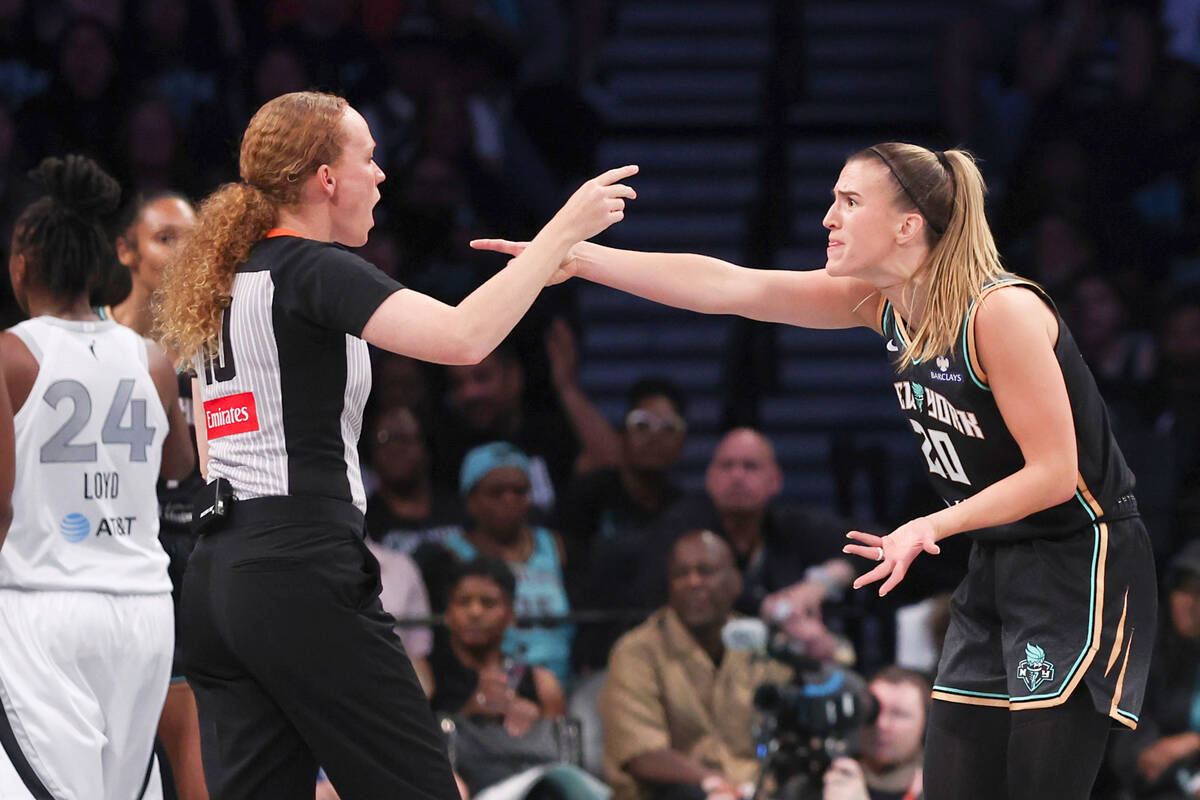 New York Liberty guard Sabrina Ionescu (20) reacts to a call during the first half of a WNBA ba ...