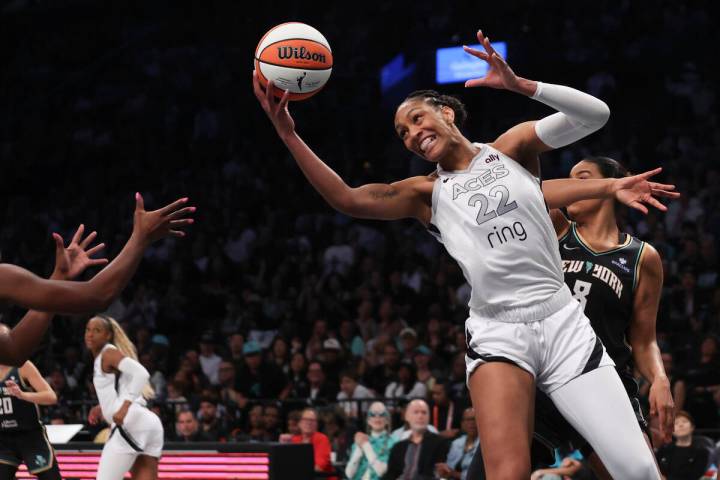 Las Vegas Aces center A'ja Wilson (22) battles for a rebound with New York Liberty center Nyara ...