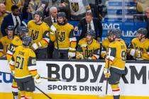 Golden Knights head coach Bruce Cassidy has instructions for his players during a timeout again ...