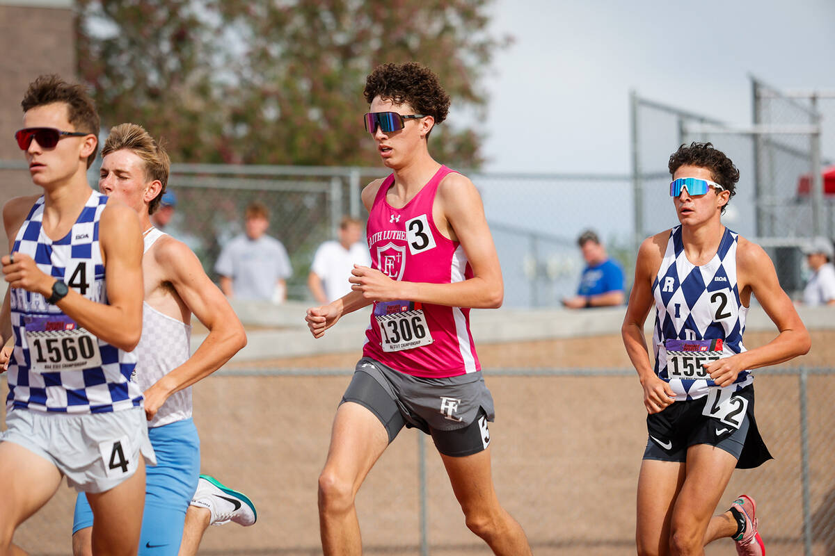 Faith Lutheran Brady Anderson (Middle) in the NIAA 5A Boys 3200-meter run final at Desert Oasis ...