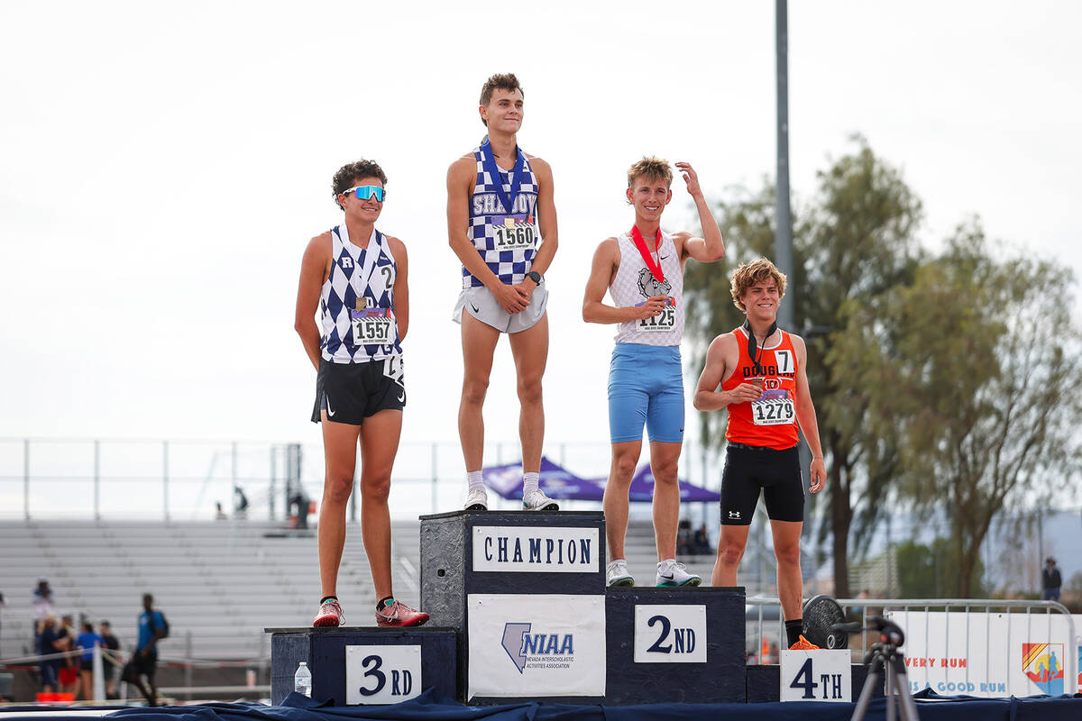 Winners of the NIAA 5A Boys 3200-meter run final at the podium at Desert Oasis High School on S ...